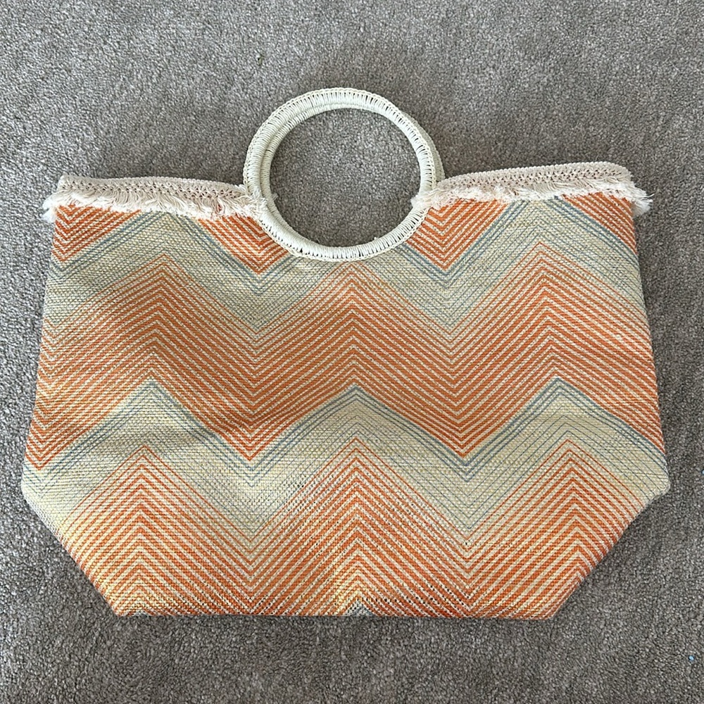 Large orange blue and cream Metallic tote with frayed finishes.